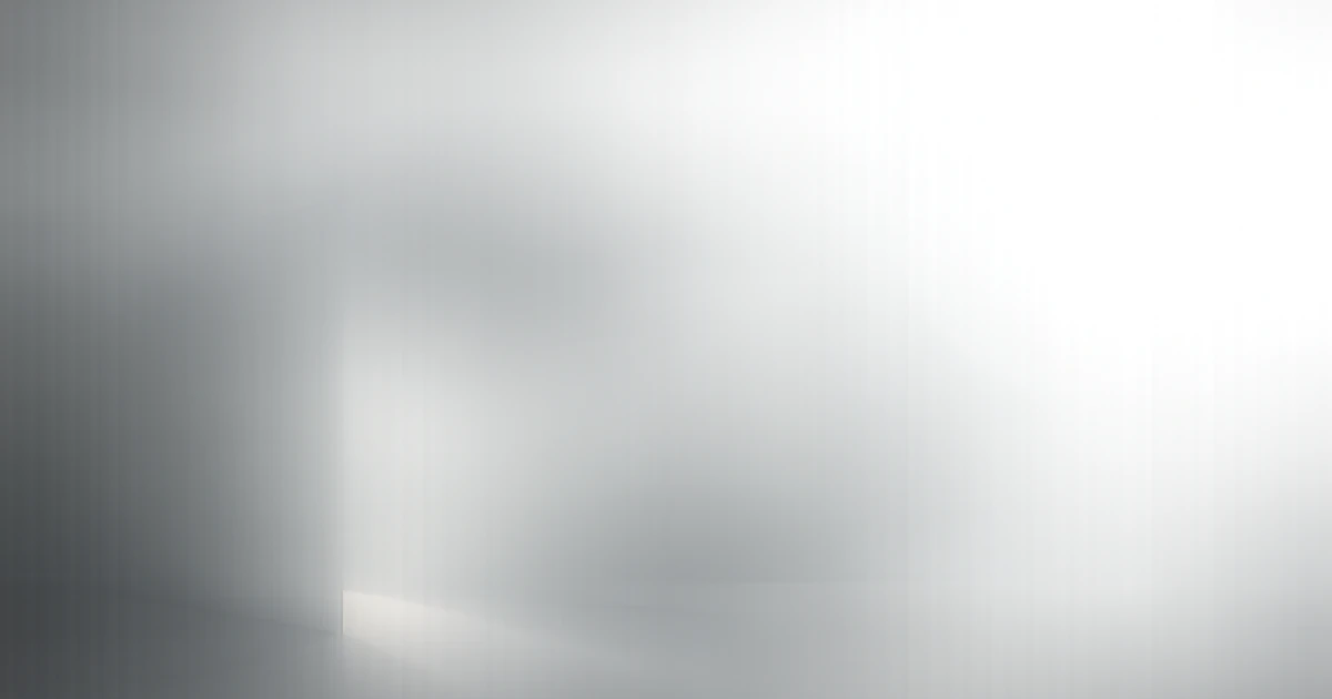 Abstract layered geometric shapes in gray and blue tones fading from opaque to transparent