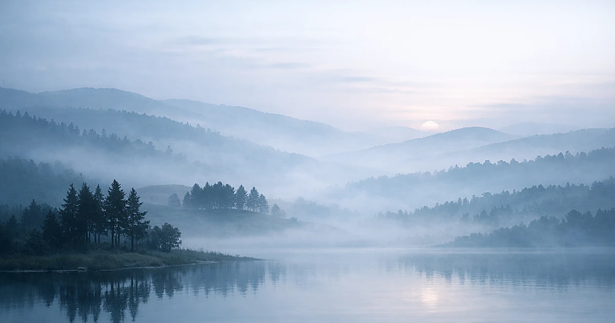 Abstract misty landscape with soft blue and gray tones representing contemplation and remembrance